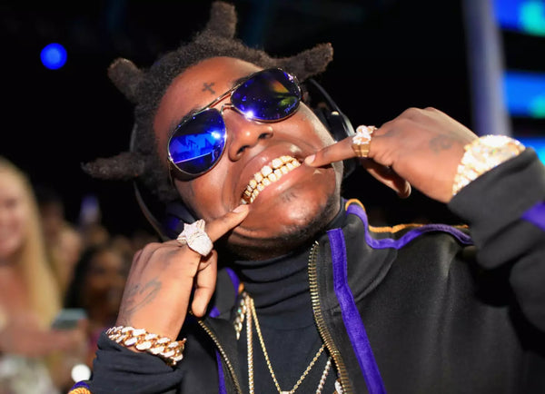 Kodak Black Teeth: New Iced Out Grillz? [Know More] - Custom Gold Grillz